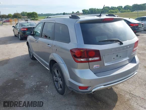 2015 Dodge Journey Crossroad with VIN 3C4PDCGG1FT630161, listed as a IAAI auction lot 42701873 with 136,798 mi miles and . Bid and sale history available at DreamBid. Image 3.
