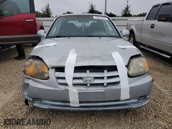 2005 Hyundai Accent GLS z VIN KMHCG35C75U354574, wystawiony jako Copart lot #74931444 z przebiegiem 141 013 mil mil oraz Szkoda całkowita • Salvage title. Historia ofert i sprzedaży dostępna na DreamBid. Obrazek 5.