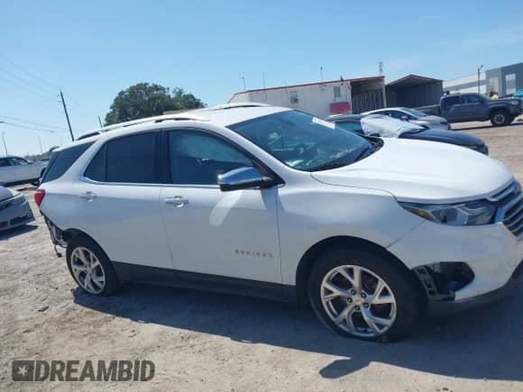 2018 Chevrolet Equinox Premier with VIN 2GNAXMEV1J6338504, listed as a IAAI auction lot 43107226 with 129,549 mi miles and . Bid and sale history available at DreamBid. Image 13.