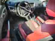 2012 Hyundai Veloster w/Black Int z VIN KMHTC6AD4CU032645, wystawiony jako Copart lot #86488855 z przebiegiem 90 307 mil mil oraz Szkoda całkowita • Salvage title. Historia ofert i sprzedaży dostępna na DreamBid. Obrazek 8.