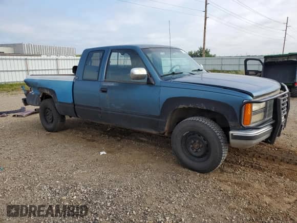 1991 GMC Sierra 1500 SLT z VIN 2GTEK19Z4M1542137, wystawiony jako Copart lot #68024074 z przebiegiem 347 281 mil mil oraz Szkoda całkowita • Salvage title. Historia ofert i sprzedaży dostępna na DreamBid. Obrazek 4.