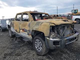 2018 Chevrolet Silverado 2500HD LT z VIN 1GC1KVEY7JF229459, wystawiony jako IAAI lot #41070959 z przebiegiem 116 100 mil mil oraz . Historia ofert i sprzedaży dostępna na DreamBid. Obrazek 1.