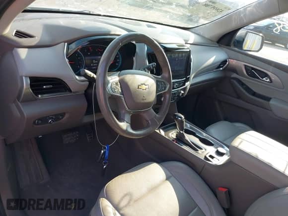 2020 Chevrolet Traverse LT z VIN 1GNEVHKW0LJ106607, wystawiony jako IAAI lot #42695708 z przebiegiem 76 700 mil mil oraz . Historia ofert i sprzedaży dostępna na DreamBid. Obrazek 18.