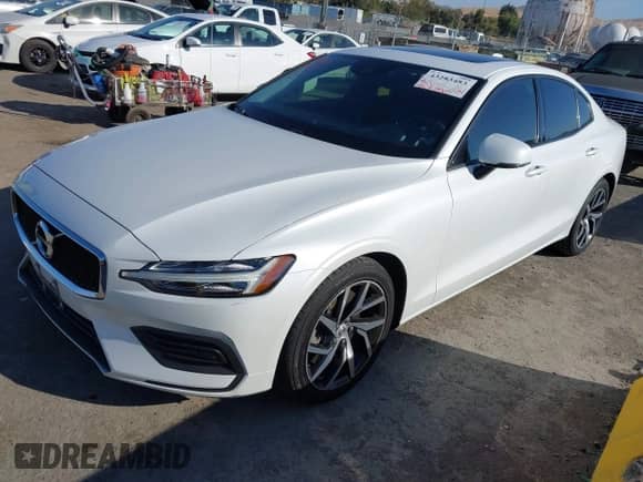 2020 Volvo S60 Momentum with VIN 7JRA22TK1LG057666, listed as a IAAI auction lot 43283483 with 137,790 mi miles and . Bid and sale history available at DreamBid. Image 2.