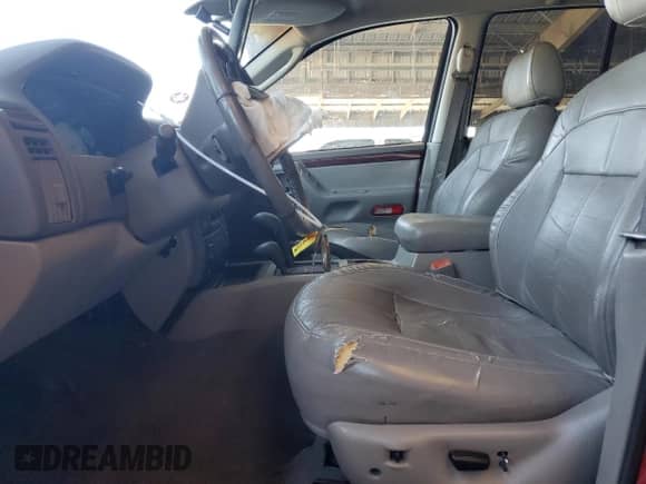 2002 Jeep Grand Cherokee Limited with VIN 1J4GW58N12C202691, listed as a Copart auction lot 64265975 with 118,480 mi miles and Salvage title. Bid and sale history available at DreamBid. Image 7.