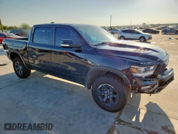 2020 Ram 1500 Rebel z VIN 1C6SRFLT0LN357023, wystawiony jako Copart lot #69025675 z przebiegiem 114 804 mil mil oraz Szkoda całkowita • Salvage title. Historia ofert i sprzedaży dostępna na DreamBid. Obrazek 4.