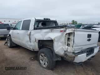 2017 Chevrolet Silverado 1500 LT z VIN 3GCUKREC7HG200481, wystawiony jako IAAI lot #42985617 z przebiegiem 164 056 mil mil oraz . Historia ofert i sprzedaży dostępna na DreamBid. Obrazek 3.