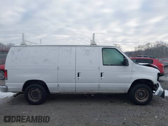 2013 Ford Econoline Cargo Commercial with VIN 1FTNE1EW1DDA21867, listed as a IAAI auction lot 41280581 with 186,166 mi miles and . Bid and sale history available at DreamBid. Image 13.