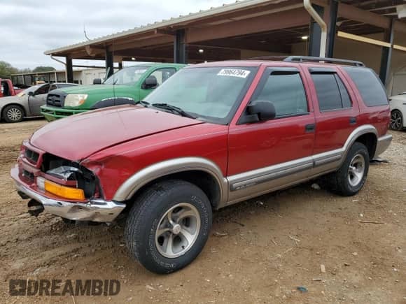 2000 Chevrolet Blazer LT with VIN 1GNCS13W3Y2213772, listed as a Copart auction lot 79964794 with 80,090 mi miles and Salvage title. Bid and sale history available at DreamBid. Image 1.
