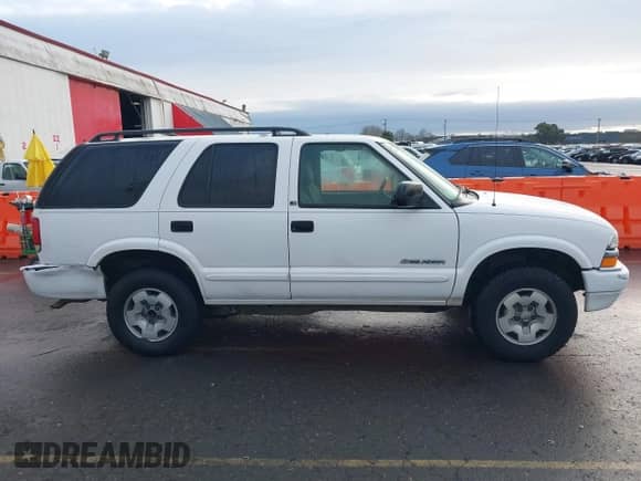 2003 Chevrolet Blazer LS with VIN 1GNDT13X63K145986, listed as a IAAI auction lot 41604061 with 158,431 mi miles and . Bid and sale history available at DreamBid. Image 13.