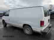 2001 Ford Econoline Cargo with VIN 1FTRE14251HA20435, listed as a Copart auction lot 44000085 with 69,015 mi miles and Salvage title. Bid and sale history available at DreamBid. Image 2.