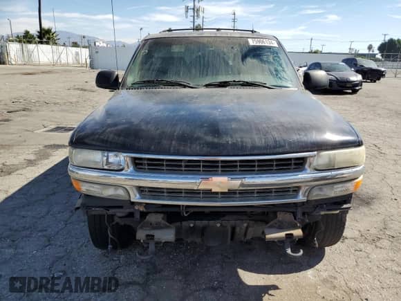2002 Chevrolet Suburban LT with VIN 3GNEC16T42G174731, listed as a Copart auction lot 75906134 with Not provided miles and Salvage title. Bid and sale history available at DreamBid. Image 5.