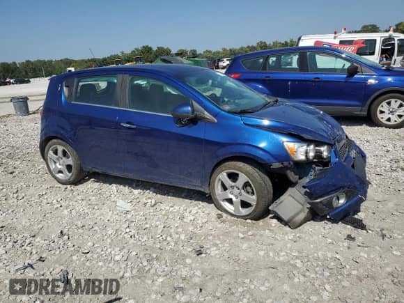 2014 Chevrolet Sonic LTZ with VIN 1G1JE6SB7E4131264, listed as a Copart auction lot 70743035 with 130,070 mi miles and Salvage title. Bid and sale history available at DreamBid. Image 4.