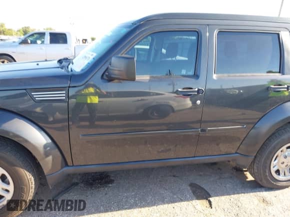 2011 Dodge Nitro SE with VIN 1D4PT2GKXBW518371, listed as a IAAI auction lot 42996578 with 186,916 mi miles and . Bid and sale history available at DreamBid. Image 14.