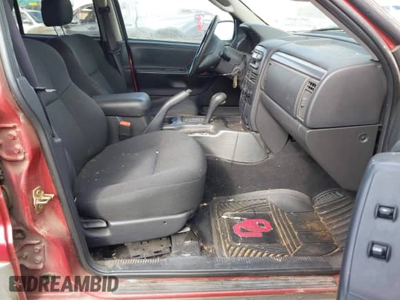 2002 Jeep Grand Cherokee Laredo with VIN 1J4GW48S22C174688, listed as a IAAI auction lot 43505430 with 215,268 mi miles and . Bid and sale history available at DreamBid. Image 5.