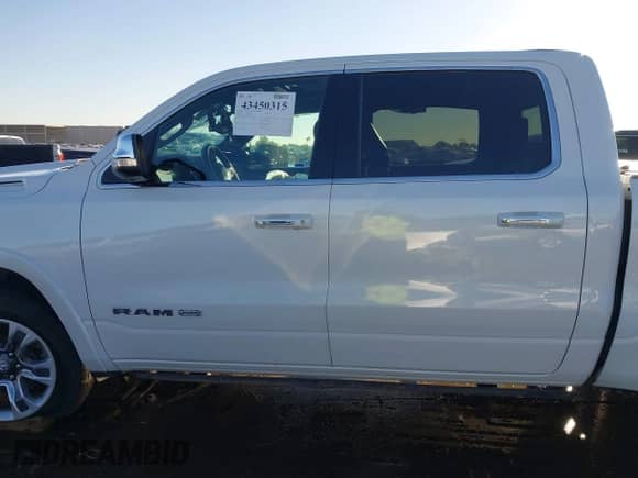 2021 Ram 1500 Longhorn with VIN 1C6SRFKT7MN679290, listed as a IAAI auction lot 43450315 with 55,494 mi miles and . Bid and sale history available at DreamBid. Image 14.