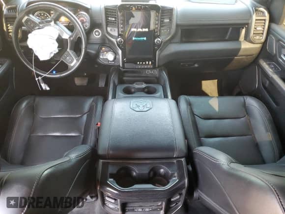 2020 Ram 1500 Rebel z VIN 1C6SRFLT0LN265734, wystawiony jako Copart lot #68314085 z przebiegiem 62 838 mil mil oraz Szkoda całkowita • Salvage title. Historia ofert i sprzedaży dostępna na DreamBid. Obrazek 8.