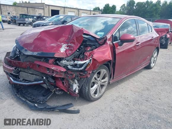 2017 Chevrolet Cruze Premier z VIN 3G1BF6SM1HS547186, wystawiony jako IAAI lot #42536555 z przebiegiem 110 805 mil mil oraz . Historia ofert i sprzedaży dostępna na DreamBid. Obrazek 2.