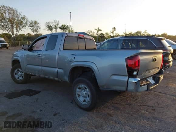 2018 Toyota Tacoma SR with VIN 5TFRX5GN8JX117075, listed as a IAAI auction lot 41723001 with 67,559 mi miles and . Bid and sale history available at DreamBid. Image 3.
