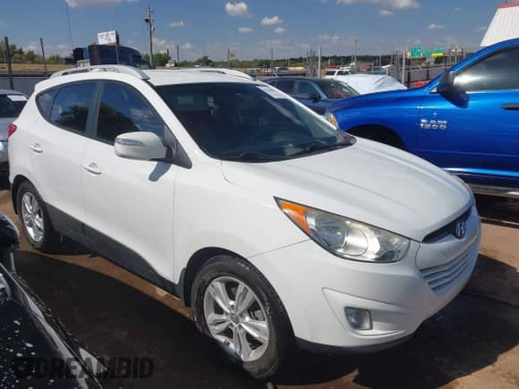 2013 Hyundai Tucson GLS z VIN KM8JU3AC0DU654168, wystawiony jako IAAI lot #43388859 z przebiegiem 186 394 mil mil oraz . Historia ofert i sprzedaży dostępna na DreamBid. Obrazek 13.