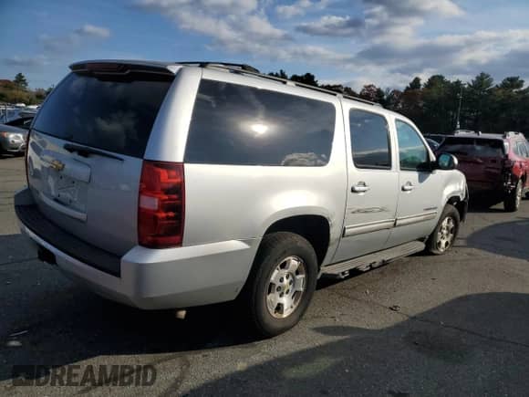 2013 Chevrolet Suburban LS with VIN 1GNSKHE76DR182853, listed as a Copart auction lot 77816574 with 232,842 mi miles and Clean title. Bid and sale history available at DreamBid. Image 3.