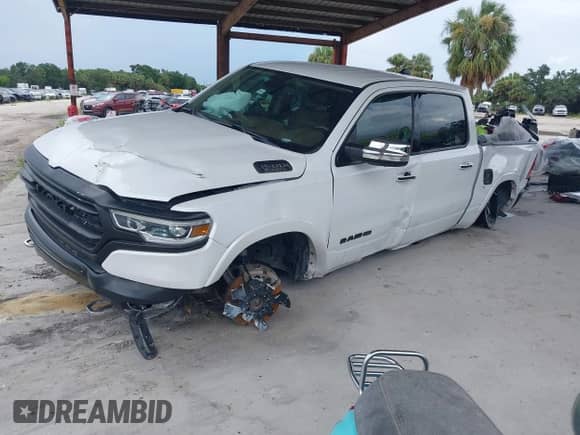 2020 Ram 1500 Longhorn with VIN 1C6SRFKT2LN414209, listed as a IAAI auction lot 42729994 with 70,390 mi miles and . Bid and sale history available at DreamBid. Image 2.
