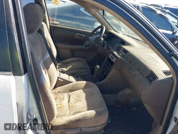 1998 Toyota Camry LE z VIN JT2BG22K3W0208583, wystawiony jako IAAI lot #43404916 z przebiegiem 270 180 mil mil oraz . Historia ofert i sprzedaży dostępna na DreamBid. Obrazek 5.