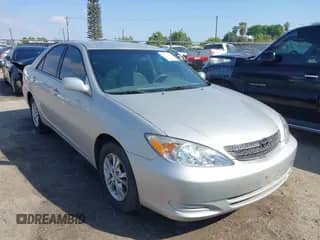 2004 Toyota Camry LE with VIN 4T1BF30K34U571471, listed as a IAAI auction lot 42104815 with 105,895 mi miles and . Bid and sale history available at DreamBid. Image 1.