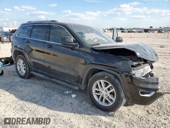 2017 Jeep Grand Cherokee Laredo with VIN 1C4RJEAG4HC685692, listed as a Copart auction lot 84569355 with 137,038 mi miles and Salvage title. Bid and sale history available at DreamBid. Image 4.