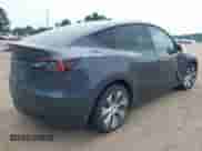 2021 Tesla Model Y Long Range with VIN 5YJYGDEE1MF217624, listed as a IAAI auction lot 42842945 with 58,610 mi miles and . Bid and sale history available at DreamBid. Image 4.