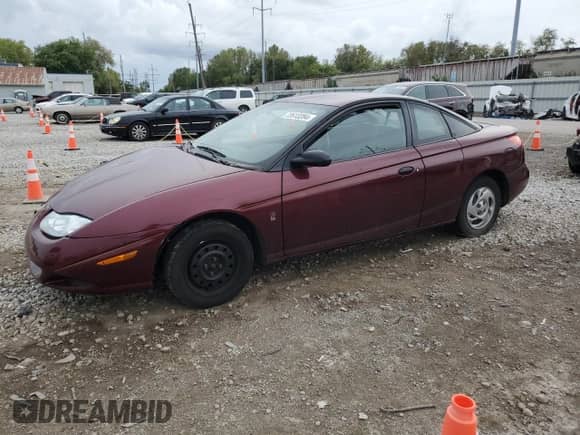 2002 Saturn SC с VIN 1G8ZP12892Z239888, выставлен на аукционе Copart как лот 72613284 с пробегом 130 138 миль миль и Списание • Salvage title. История ставок и продаж доступна на DreamBid. Изображение 1.
