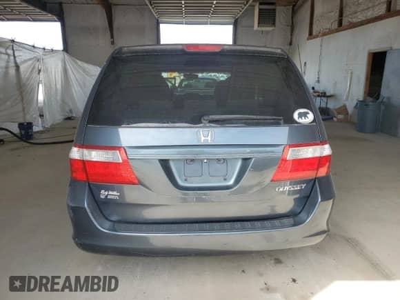 2005 Honda Odyssey LX with VIN 5FNRL38295B111631, listed as a Copart auction lot 67017355 with 238,272 mi miles and Clean title. Bid and sale history available at DreamBid. Image 6.