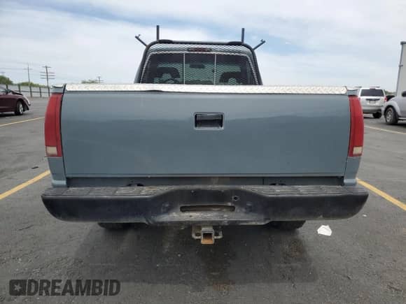 1994 Chevrolet Silverado 2500 с VIN 1GCFK24K5RZ275125, выставлен на аукционе Copart как лот 61460855 с пробегом 238 068 миль миль и Списание • Salvage title. История ставок и продаж доступна на DreamBid. Изображение 6.