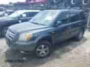 2006 Honda Pilot EX-L z VIN 5FNYF285X6B037032, wystawiony jako IAAI lot #42232591 z przebiegiem 205 551 mil mil oraz . Historia ofert i sprzedaży dostępna na DreamBid. Obrazek 17.