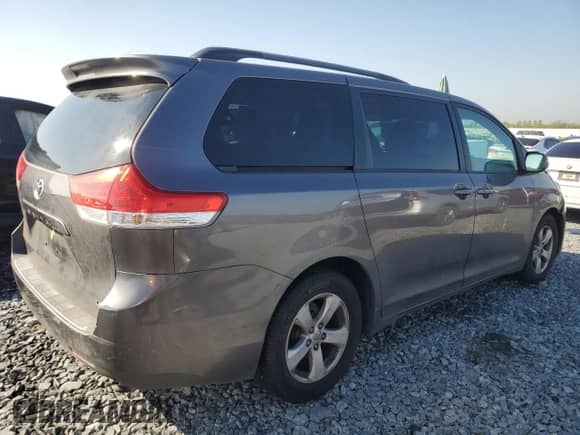 2014 Toyota Sienna LE AAS with VIN 5TDKK3DC5ES456637, listed as a Copart auction lot 87417215 with 103,902 mi miles and Salvage title. Bid and sale history available at DreamBid. Image 3.