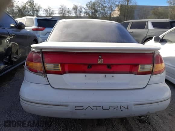 1998 Saturn SC с VIN 1G8ZH1279WZ120989, выставлен на аукционе Copart как лот 84348634 с пробегом 117 748 миль миль и На запчасти • Non repairable. История ставок и продаж доступна на DreamBid. Изображение 6.