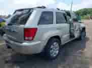 2009 Jeep Grand Cherokee with VIN 1J8HR68T09C523470, listed as a IAAI auction lot 42764630 with 131,376 mi miles and . Bid and sale history available at DreamBid. Image 4.