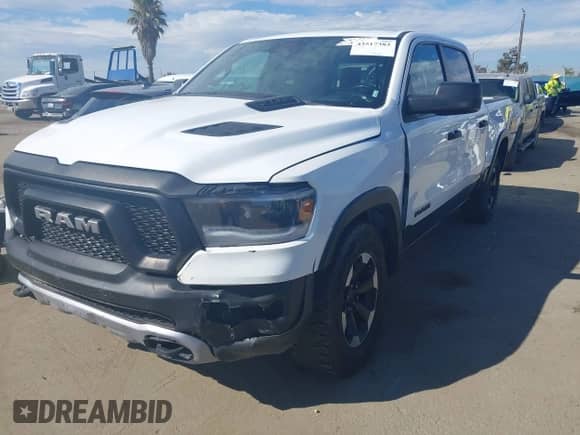 2022 Ram 1500 Rebel z VIN 1C6SRFLT4NN158883, wystawiony jako IAAI lot #43517383 z przebiegiem 45 447 mil mil oraz . Historia ofert i sprzedaży dostępna na DreamBid. Obrazek 19.