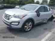 2014 Hyundai Santa Fe with VIN 5XYZU3LA2EG173067, listed as a IAAI auction lot 43309222 with 136,499 mi miles and . Bid and sale history available at DreamBid. Image 2.