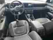 2025 Hyundai Tucson SEL Convenience with VIN 3KMJC3DE8SE018045, listed as a Copart auction lot 65944465 with 879 mi miles and Salvage title. Bid and sale history available at DreamBid. Image 8.