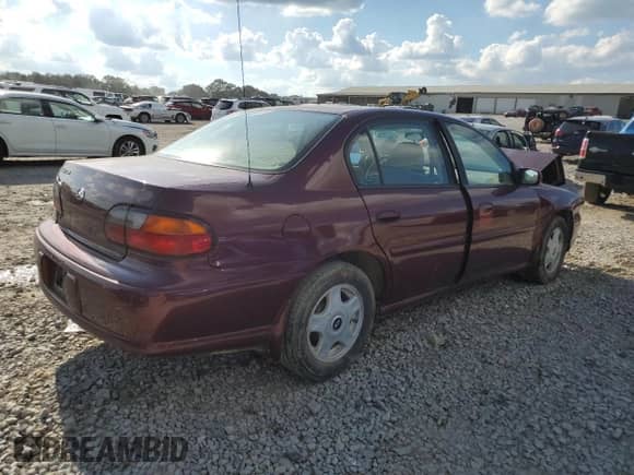 2001 Chevrolet Malibu LS z VIN 1G1NE52J016153947, wystawiony jako Copart lot #73813784 z przebiegiem 129 336 mil mil oraz Szkoda całkowita • Salvage title. Historia ofert i sprzedaży dostępna na DreamBid. Obrazek 3.