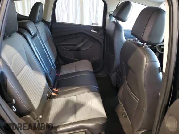 2017 Ford Escape Titanium с VIN 1FMCU9JD2HUD17267, выставлен на аукционе Copart как лот 86828485 с пробегом 72 989 миль миль и Списание • Salvage title. История ставок и продаж доступна на DreamBid. Изображение 11.