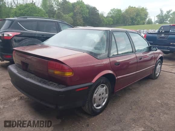 1994 Saturn SL with VIN 1G8ZH5594RZ230566, listed as a IAAI auction lot 42090623 with 149,191 mi miles and . Bid and sale history available at DreamBid. Image 4.