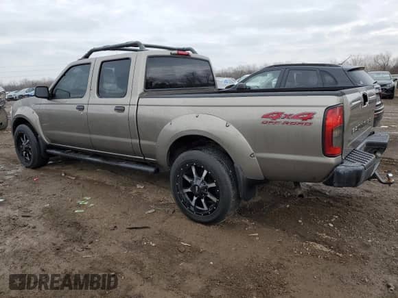 2004 Nissan Frontier XE z VIN 1N6ED29Y54C462070, wystawiony jako Copart lot #85443024 z przebiegiem Nie podano mil oraz Szkoda całkowita • Salvage title. Historia ofert i sprzedaży dostępna na DreamBid. Obrazek 2.