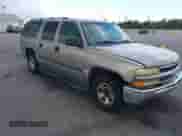 2004 Chevrolet Suburban LT z VIN 1GNEC16Z74J107885, wystawiony jako IAAI lot #42686925 z przebiegiem 232 388 mil mil oraz . Historia ofert i sprzedaży dostępna na DreamBid. Obrazek 1.