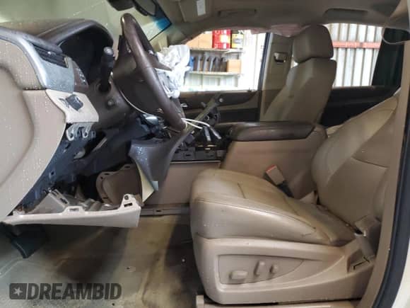 2015 Chevrolet Suburban LTZ with VIN 1GNSCKKC7FR171794, listed as a Copart auction lot 82497255 with Not provided miles and Salvage title. Bid and sale history available at DreamBid. Image 7.