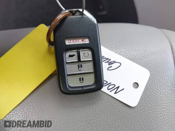 2022 Honda Pilot Touring 7-Passenger z VIN 5FNYF5H61NB019768, wystawiony jako IAAI lot #42438780 z przebiegiem Nie podano mil oraz . Historia ofert i sprzedaży dostępna na DreamBid. Obrazek 11.