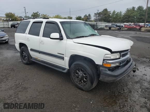 2001 Chevrolet Tahoe LT with VIN 1GNEK13T61J100084, listed as a Copart auction lot 83929515 with 186,610 mi miles and Salvage title. Bid and sale history available at DreamBid. Image 4.