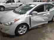 2013 Hyundai Elantra GLS z VIN 5NPDH4AE6DH300890, wystawiony jako IAAI lot #43073166 z przebiegiem 163 666 mil mil oraz . Historia ofert i sprzedaży dostępna na DreamBid. Obrazek 6.