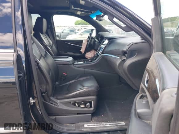 2015 Cadillac Escalade Platinum z VIN 1GYS4PKJ8FR568958, wystawiony jako IAAI lot #42316098 z przebiegiem 152 661 mil mil oraz . Historia ofert i sprzedaży dostępna na DreamBid. Obrazek 5.